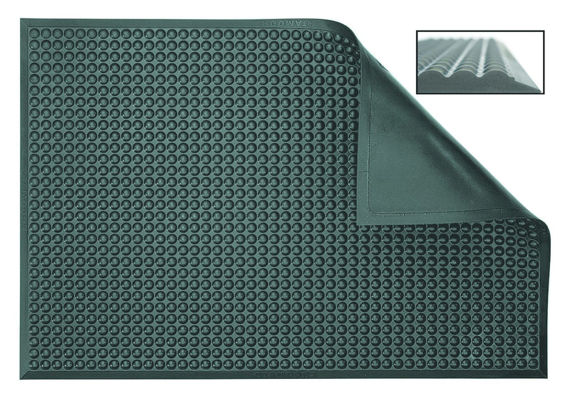 Green bubble mat with raised oval studs and corner fold detail, textured surface