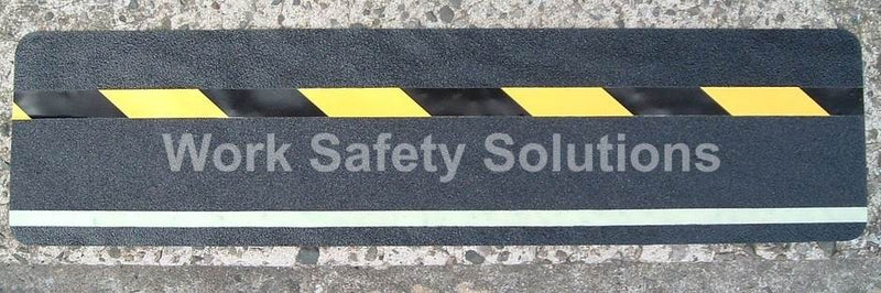 Safety grip strip with yellow-and-black hazard stripes and wide white reflective band
