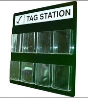 Green tag station board with two rows of empty clear compartments