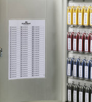 Key cabinet interior with numbered slots and color-coded key clips