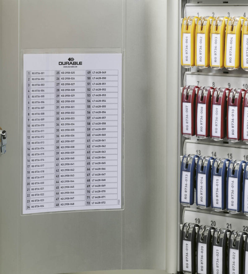 Key cabinet interior with numbered slots and color-coded key clips