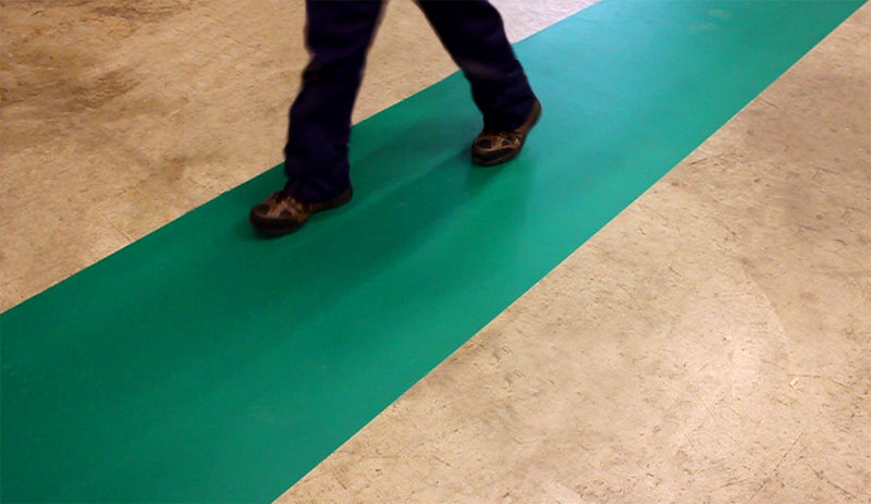 Green floor tape strip for floors, wide adhesive stripe laid along the ground
