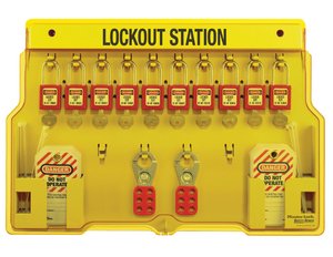 Lockout station board with multiple padlock locks and safety tags in yellow tray