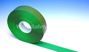Safety floor tape roll with green strip and white center roll hole