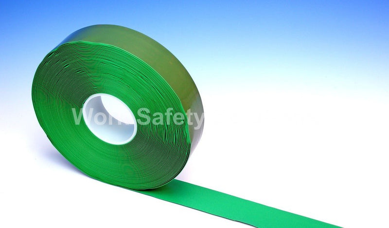 Safety floor tape roll with green strip and white center roll hole