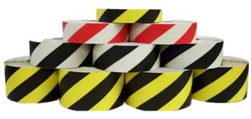 Safety hazard tape roll with alternating black and yellow diagonal stripes